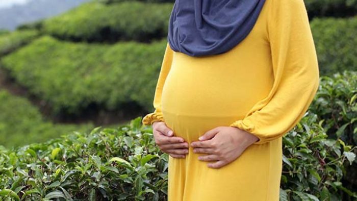 ألم الظهر بداية الحمل وجنس الجنين