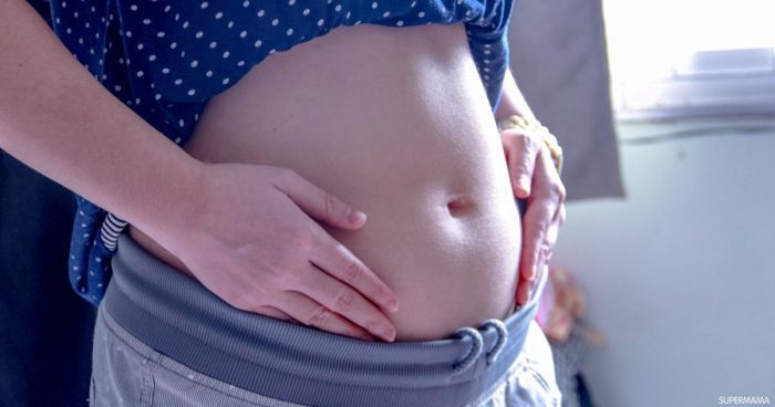 أسباب ألم أسفل البطن في الأسبوع الأول من الحمل